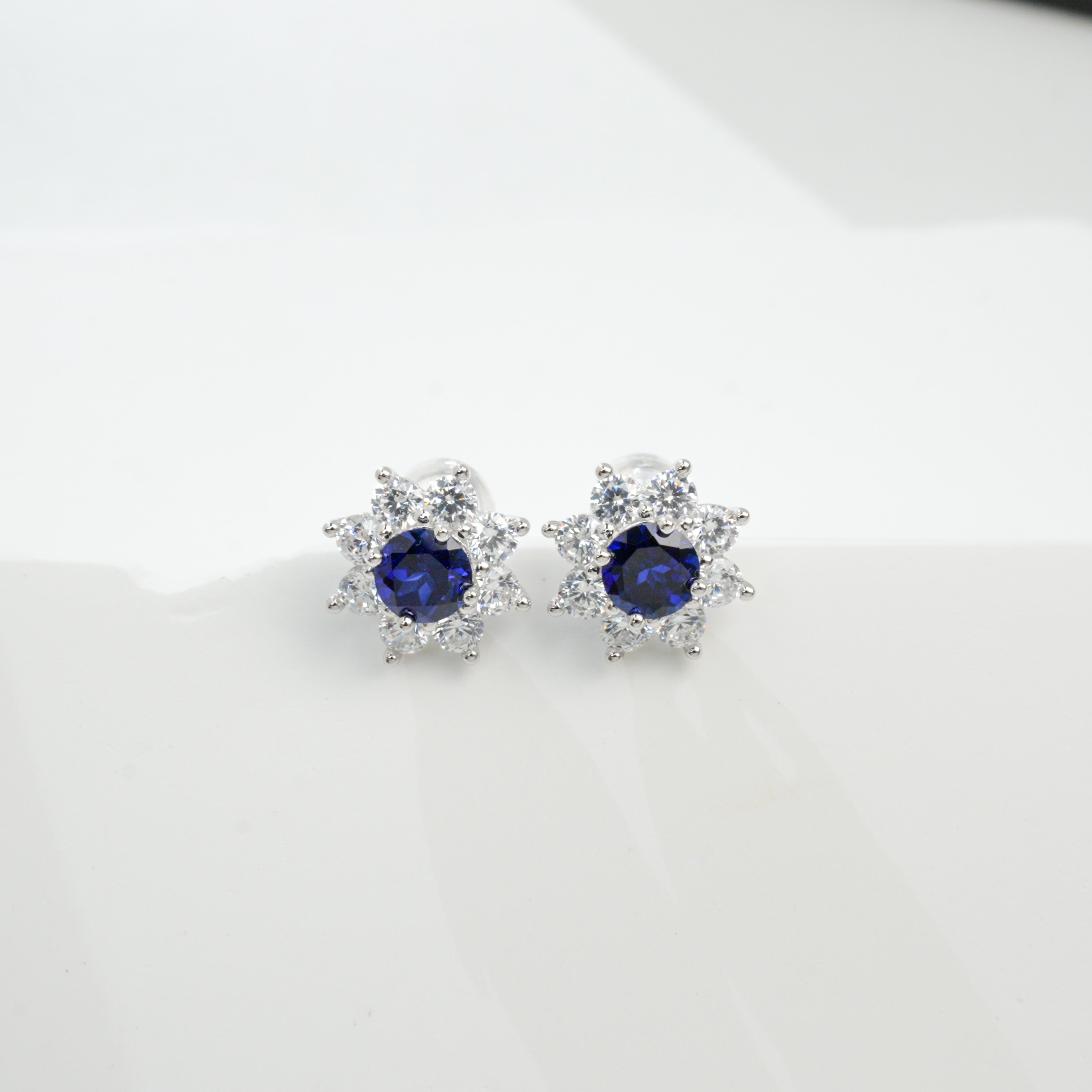 Lab-Grown Sapphire - Round Indigo Sapphire Diamond Flower Cluster Stud Earrings